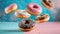 Flying doughnuts on blue and pink background