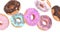 flying doughnuts - mix of multicolored sweet donuts with sprinkles on white background isolated. 3d animation