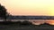 Flying Doves Over a Picturesque And Rough Lake at Sunset in Slo-Mo