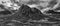 Flying drone epic  black and white landscape image of Buachaille Etive Mor and surrounding mountains and valleys in Scottish