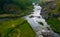 Flying on drone over an evening picturesque valley with stormy streams and rapids of Iset river, tourist places to travel. Ural,