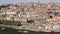 Flying with drone in Porto above town over the Douro river in Porto, Portugal