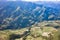 Flying drone towards beautiful amazing famous Mt. Hehuan in Taiwan over above the hilltop, aerial view shot