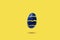 Flying easter cut egg on yellow background