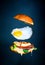 Flying Egg Burger with mayo and aioli. Hamburger fast food