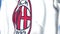 Flying flag with AC Milan football club logo, close-up. Editorial 3D rendering