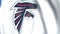 Flying flag with Atlanta Falcons team logo, close-up. Editorial loopable 3D animation