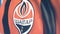 Flying flag with Shakhtar Donetsk football team logo, close-up. Editorial loopable 3D animation