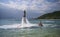 Flying on a flyboard on Winpearl beach with a view of the city of Nha Trang in Vietnam. January 18, 2020