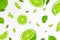 Flying fresh limes and lime slices background, seamless pattern with defocused blur effect. Can be used for wallpaper, banner,