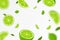 Flying fresh limes and lime slices background, seamless pattern with defocused blur effect. Can be used for wallpaper, banner,