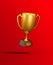 Flying golden trophy cup on red background