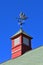 Flying goose wind vane on top of a cupola