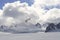 Flying helicopter on glacier