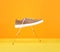 Flying leather men`s sneaker with a white sole held by threads on a yellow-orange background