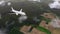 Flying low brandless airliner and ground below 4K