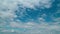 Flying Moving White Clouds In A Blue Sky. Blue Sky Background With Many Layers Tiny Clouds.