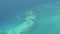 Flying over The Bahamas. Beautiful ocean colors. Actual aerial footage