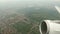 Flying over Berlin, capital of Germany with a airplane. small clouds and cityscape. started from Tegel airport.