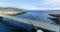 Flying over bridge along a fjord in Iceland