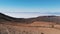 Flying over the desert landscape at the foot of the volcano. Martian or lunar landscape. Teide National Park, Tenerife