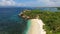 Flying over deserted secret sandy Mushroom beach