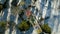 Flying over the Ferris wheel in an amusement park in winter. Aerial.