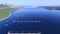 Flying over fish farm in deep blue Dalmatian sea
