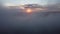 Flying over foggy lake early morning at sunrise. Drone video.