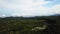 Flying Over Green Tropical Rainforest Jungle. Aerial 4K Drone Birds Eye View Natural Footage Background. Bali, Indonesia