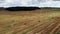 flying over haystacks round field hay aerial view, beatiful landscape