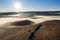 Flying over hills in mystic foggy winter morning. Aerial view