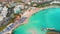 Flying over island. Landscape. Mediterranean Sea and the coast. Nissi Beach. Cyprus. City resort. Blue lagoon with rocks