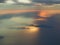 Flying over the island of Majorca during sunset. View from the airplane window. Mallorca, Spain
