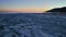 Flying over a lake covered in hummocks. Ice debris piled on top of each other