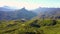 Flying over lush landscape and mountains at Gran Canaria