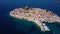 Flying over resort adriatic town Primosten, Croatia.