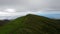 Flying over ridge peak Low Flight Over An Amazing Mountain Range Island Azores