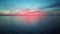 Flying Over Sea in a Beautiful Colorful Sunset. Aerial Drone Shoot. Sunrise Over the Sea.