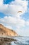 Flying paraglider