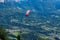 Flying with paragliders jumping from mount Dolada in Alpago,