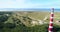 Flying Past the Ameland Lighthouse, Terschelling Visible - Ameland, The Netherlands, 4K Drone Footage