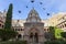 Flying pigeons at mudejar cloister of Guadalupe Monastery