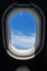 Flying on the plane seeing beautiful abstract white cloud and shades of bright blue sky background with afternoon sunlight