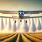 A flying plane sprays agricultural fields.