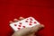 Flying playing cards in a hands