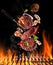 Flying raw milled beef meat with ingredients above grill fire