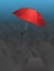 Flying Single Red Umbrella