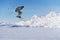 Flying skier on mountains