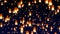 Flying sky lanterns in the night sky